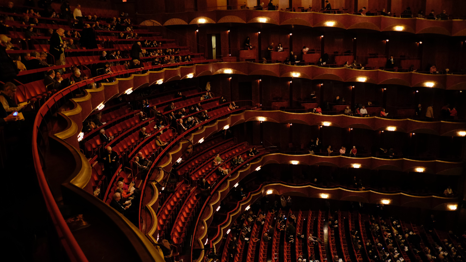 An inside view of the Royal Albert Hall, with people at their seats