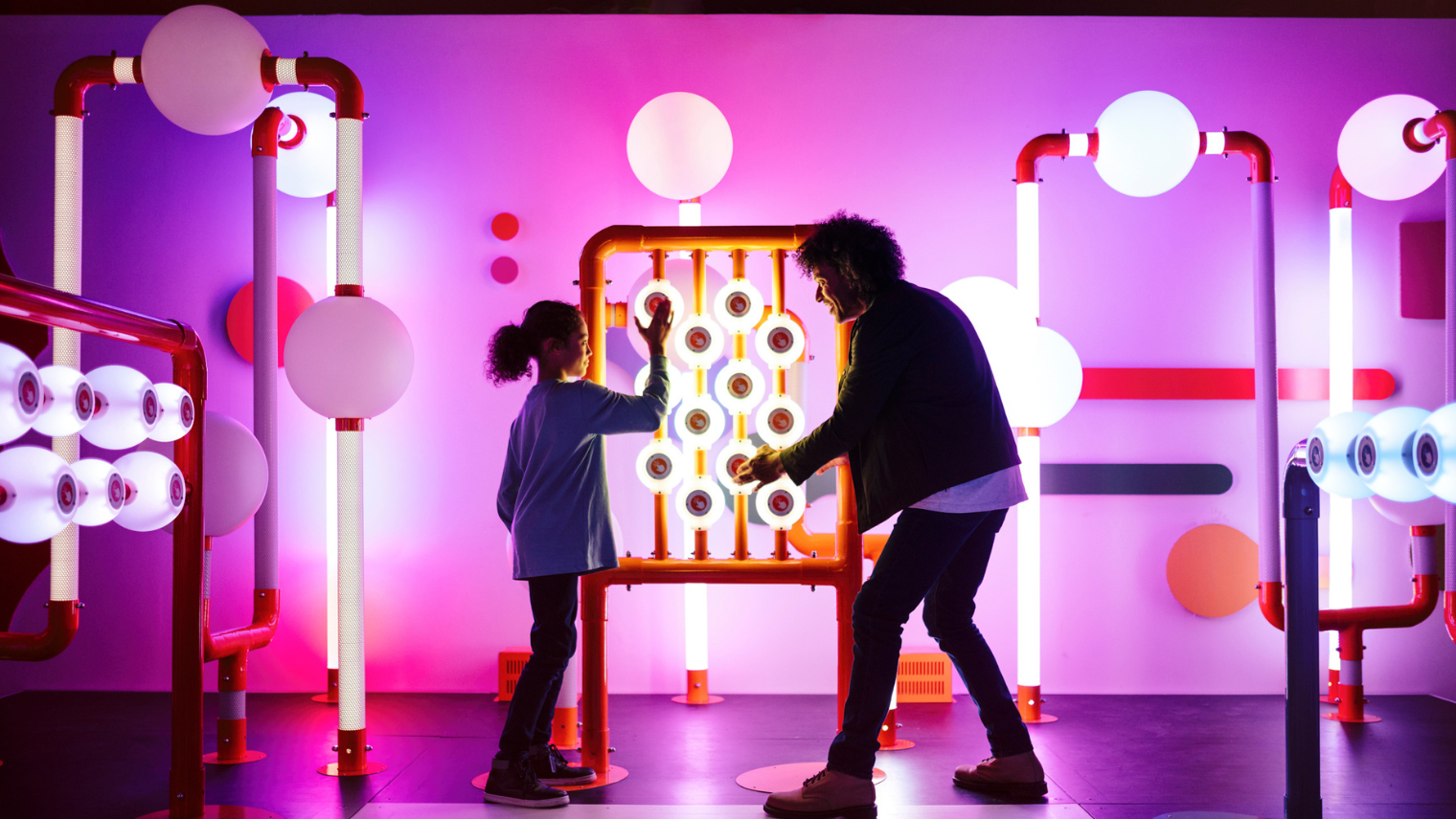 Adult and child at a Science Museum exhibition 