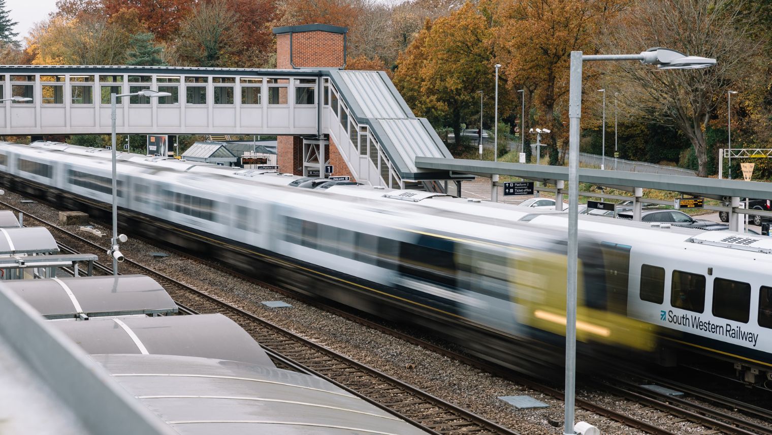 Class 450 passing through Fleet station