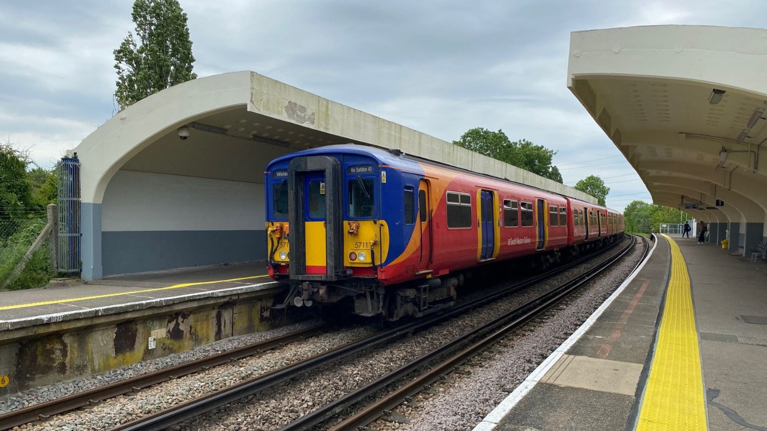 Class 455 train at platform at Malden Manor station