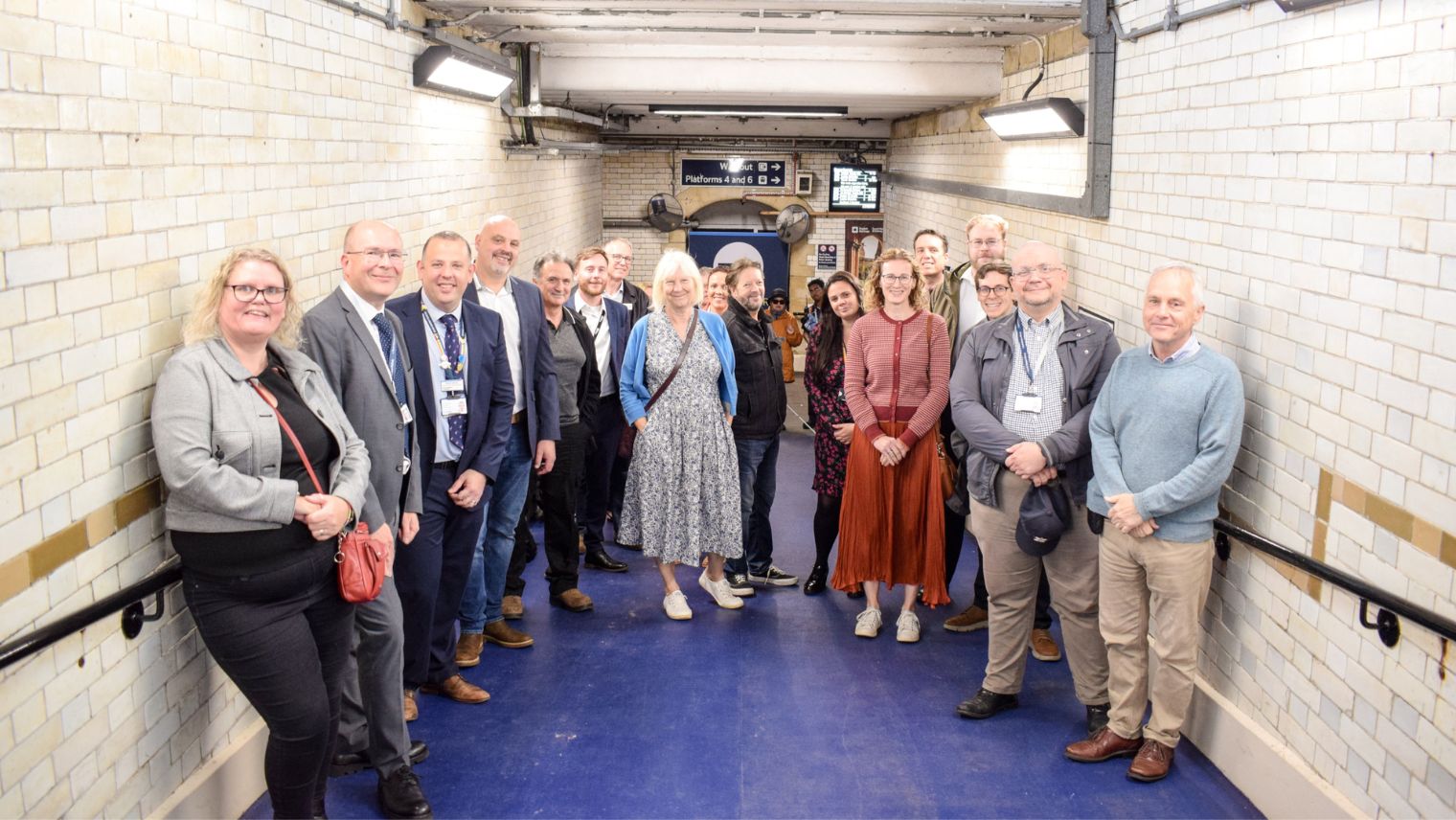 Group of people standing in subway tunnel at Salisbury station