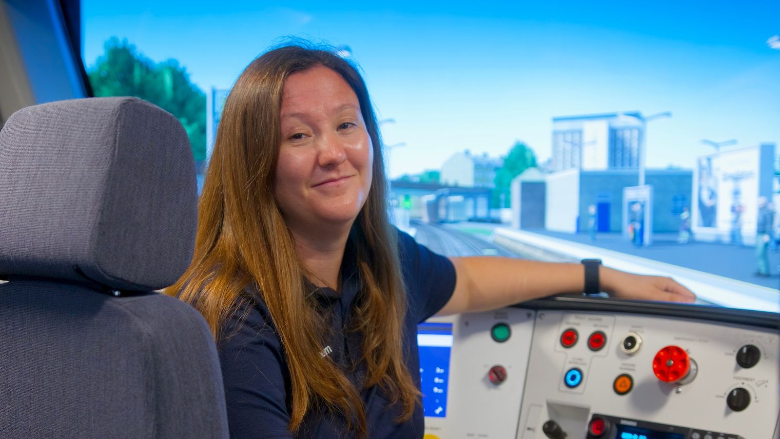 SWR driver Sally sitting in a rail simulator