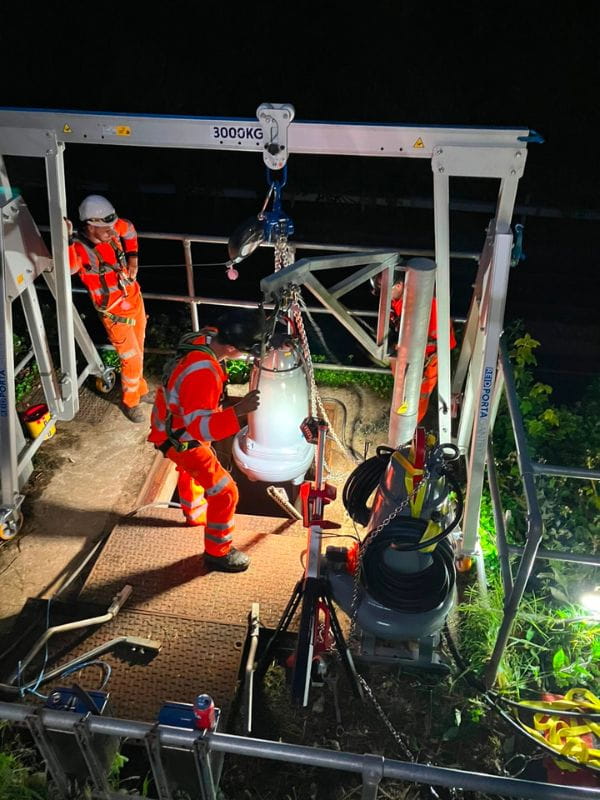 Engineers installing the new pumps in the Fullerton Tunnel - South Western Railway