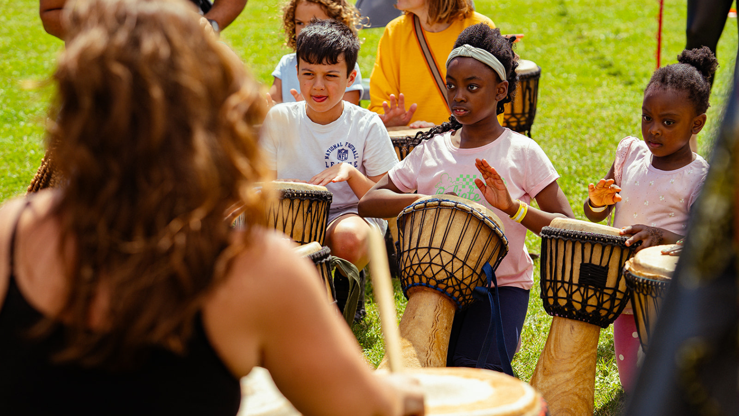 Children taking part in African drumming sessions I South Western Railway