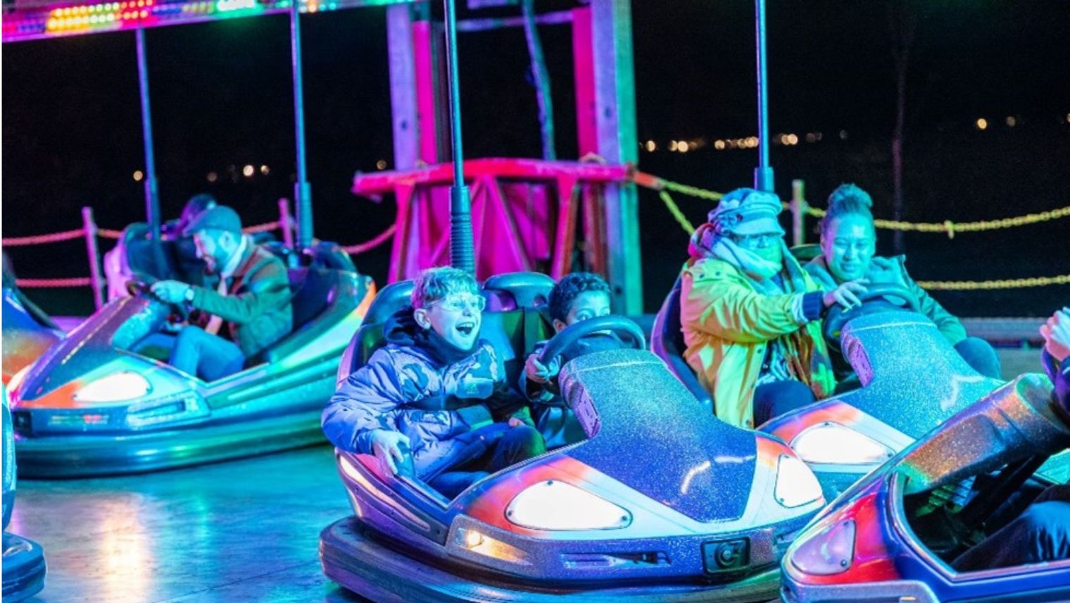 People enjoying the bumper cars at Battersea Park Fireworks