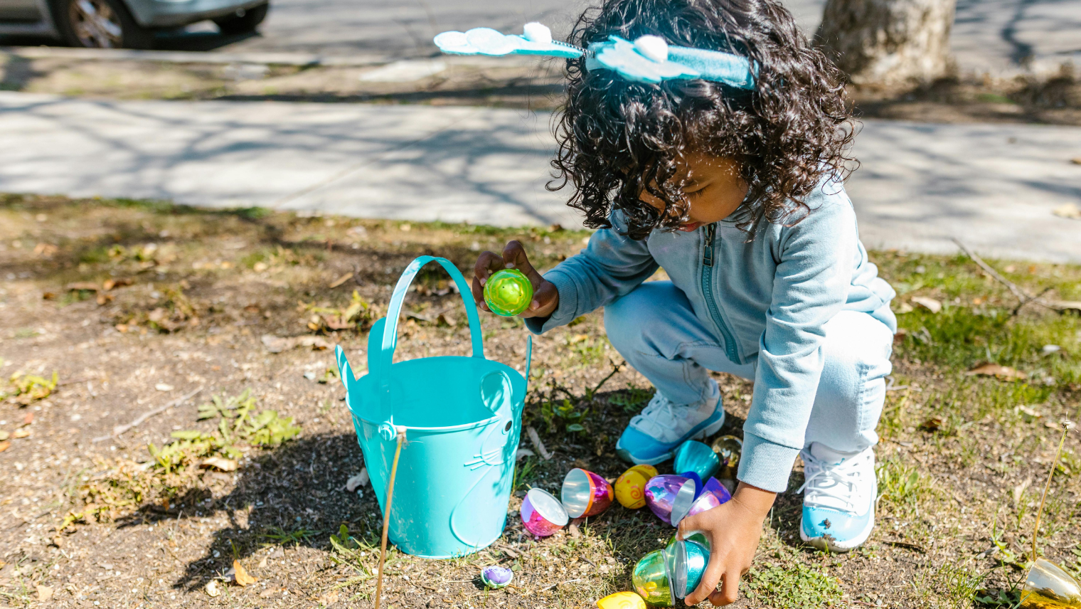 A child doing an Easter egg hunt
